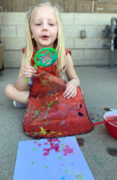 abigail blowing bubbles